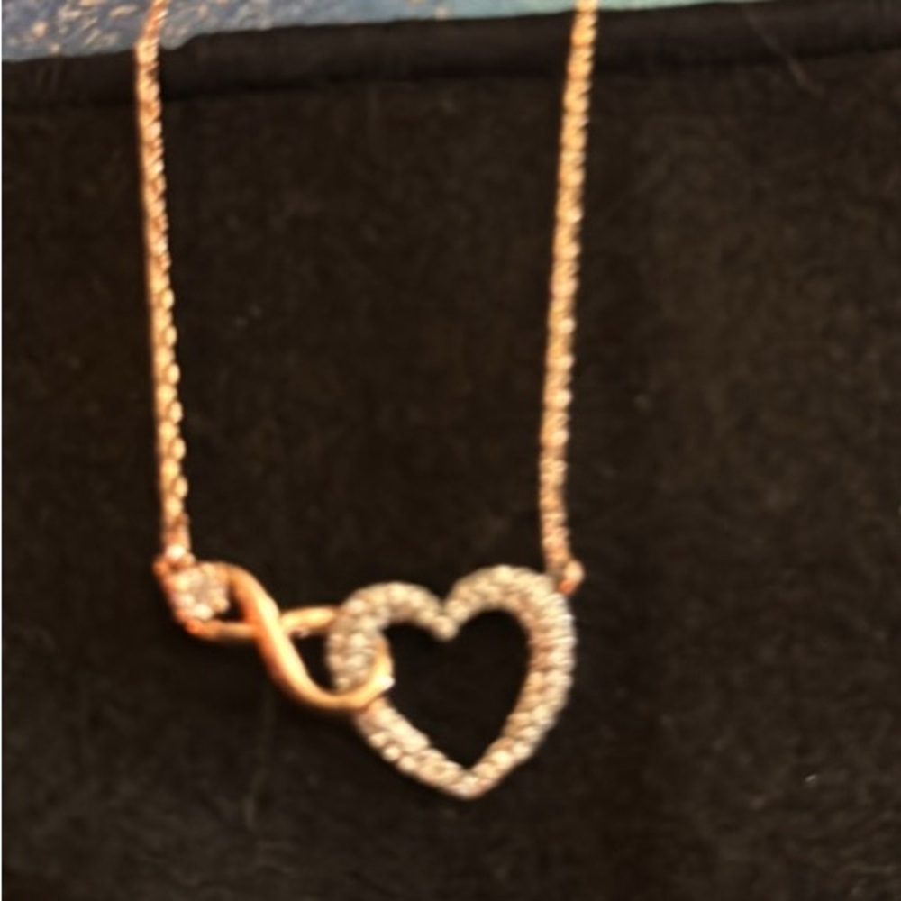CZ Heart and Infinity Necklace. Never worn. Perfect Condition.